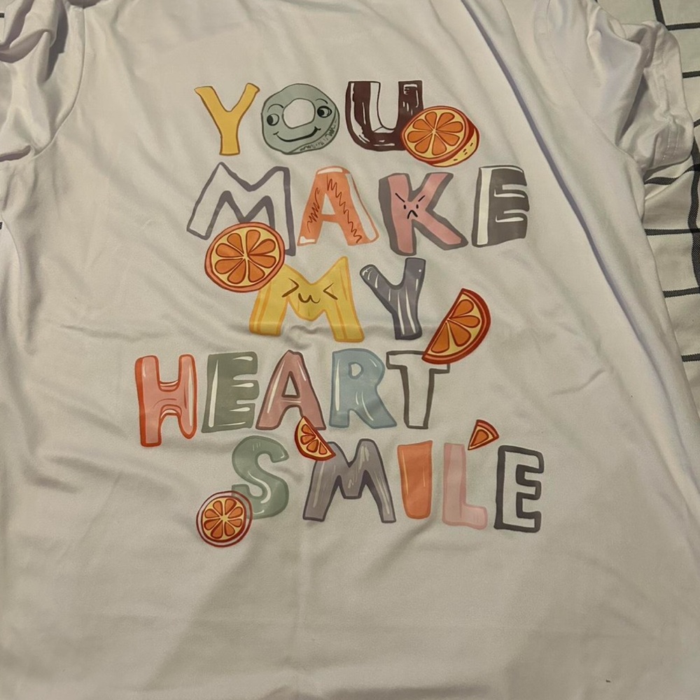 White Graphic Tee with Colorful Lettering